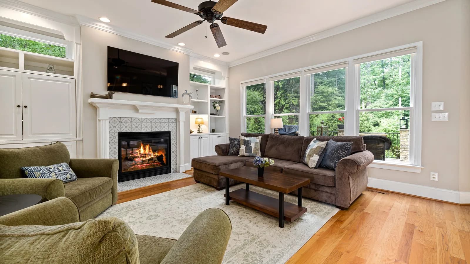 Ceiling fan centered above a living room seating area.