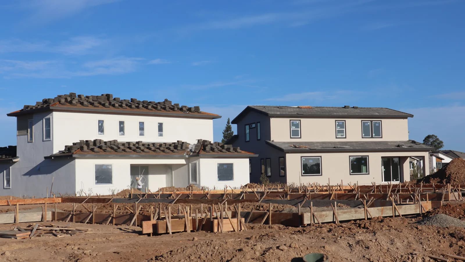 New homes under construction in Elk Grove, CA, showcasing modern architectural design.