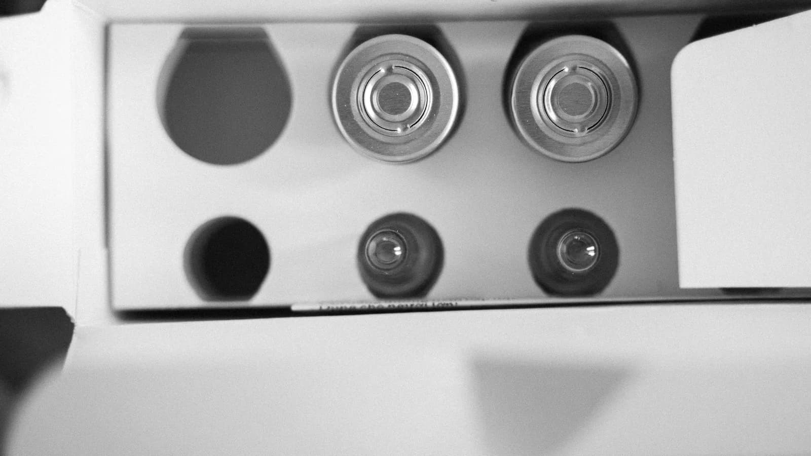 Household batteries held in separate slots inside their packaging